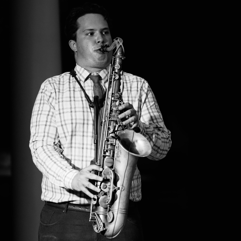 Hyrum Baird playing tenor saxophone